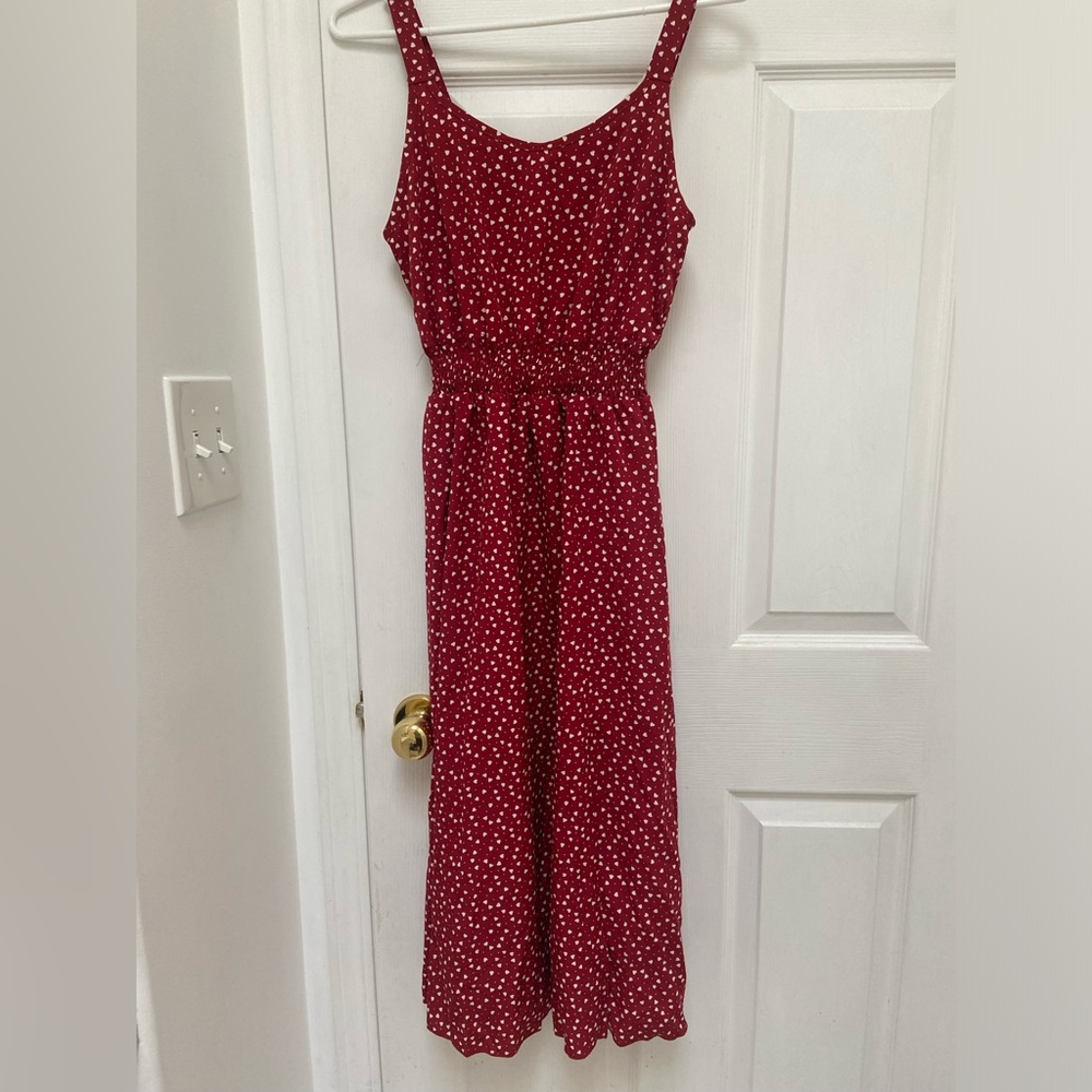 Never worn but no tags, size small red dress with white hearts